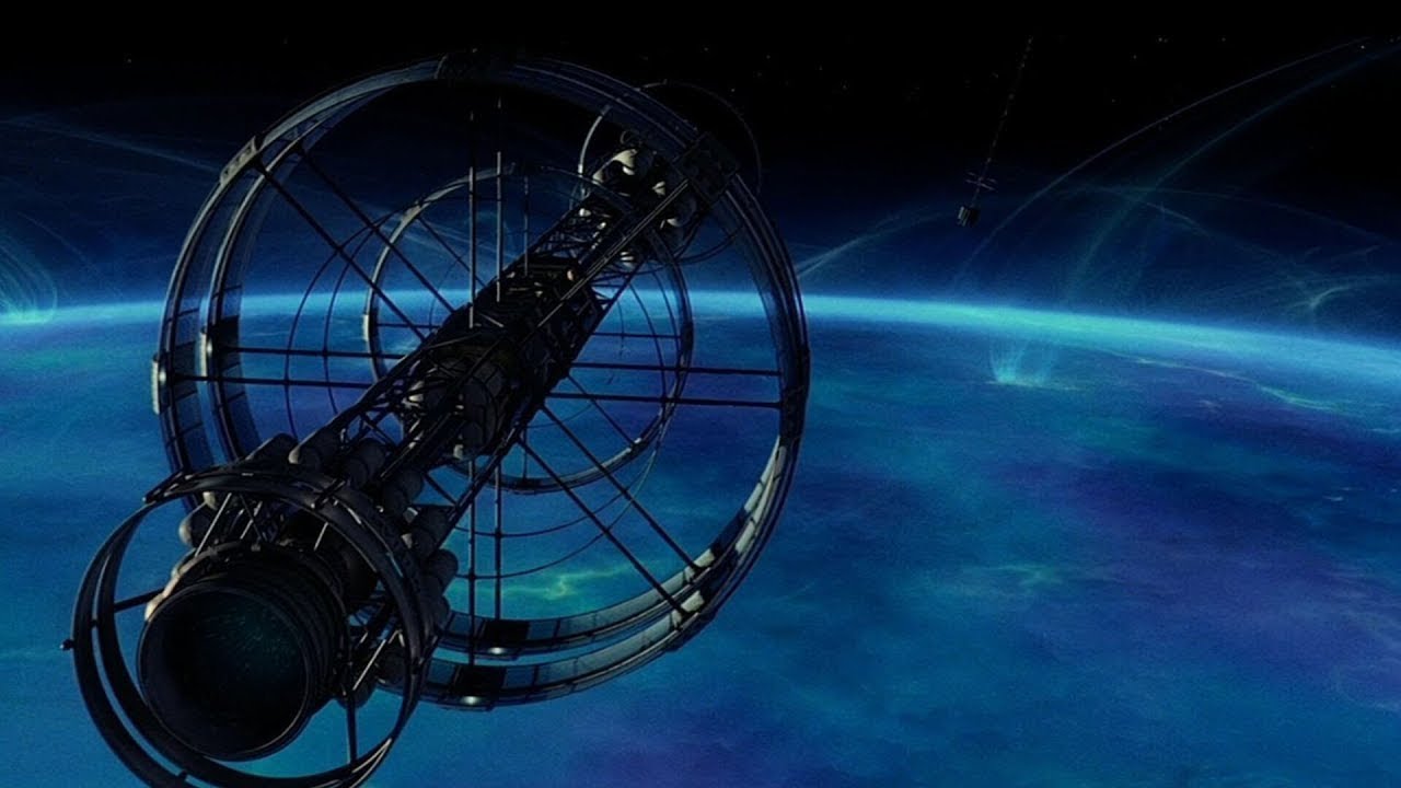 A dark orbital structure above the blue curve of Earth.